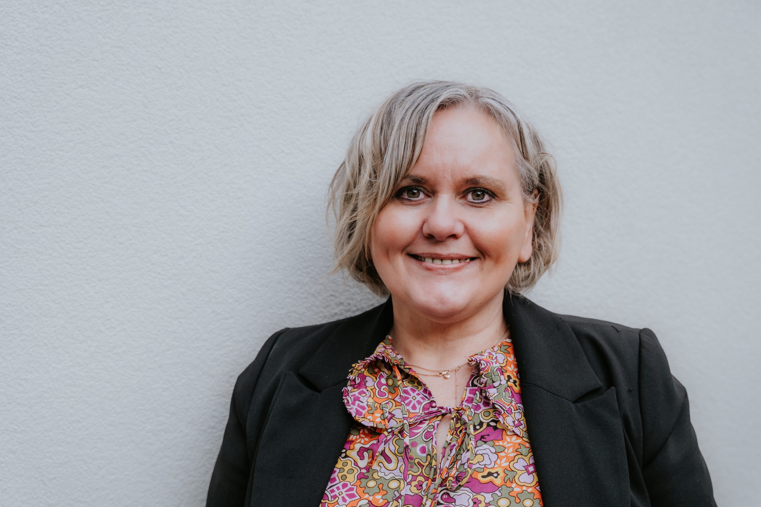 Woman using disposable camera