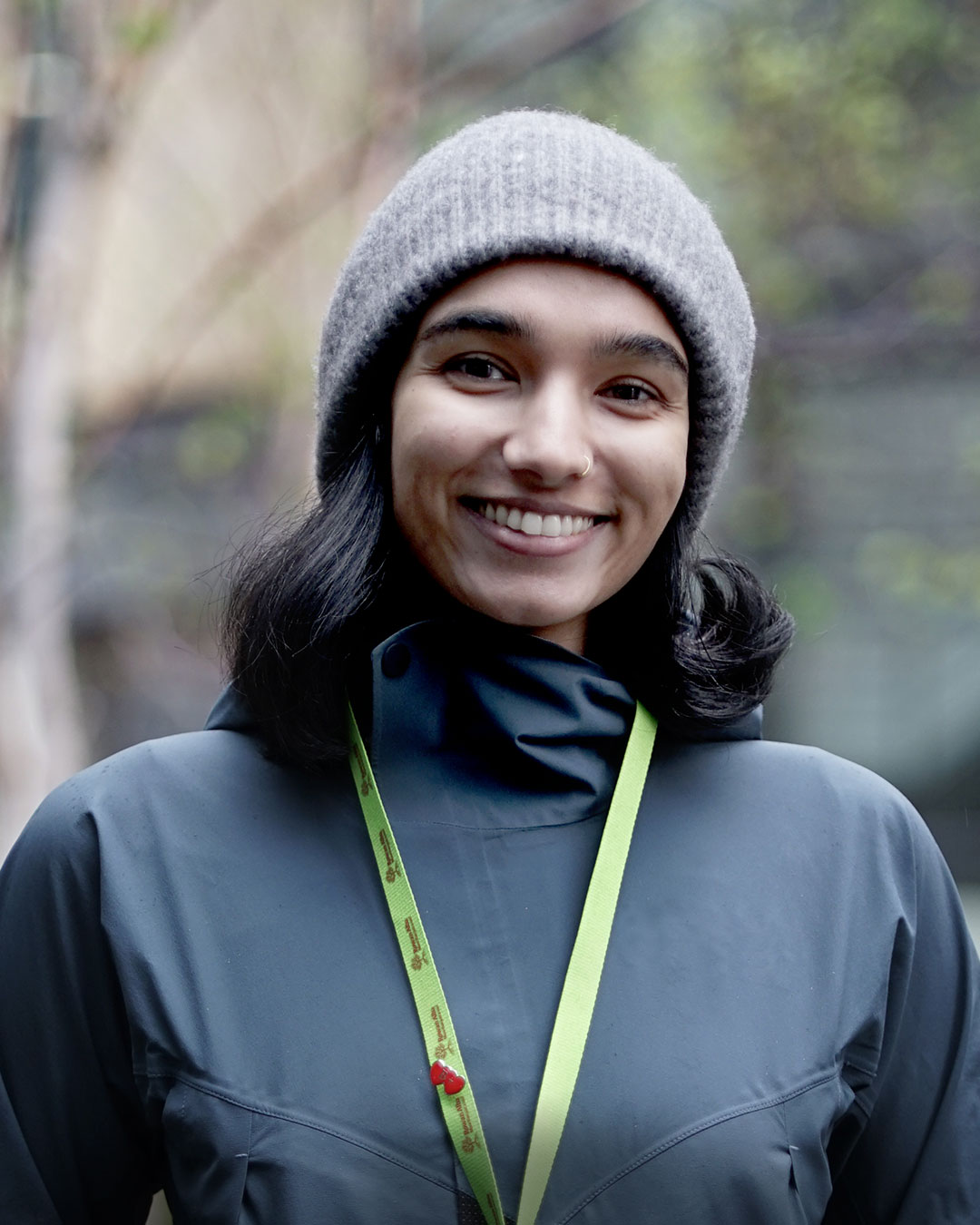 Image of smiling woman wearing a hat